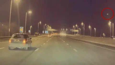 A still from the dashcam footage which captured a meteor in the skies above the East Midlands