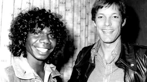 Getty Images David Gulpilil with US actor Richard Chamberlain in 1977