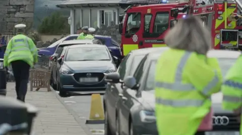 BBC A picture of police at the scene