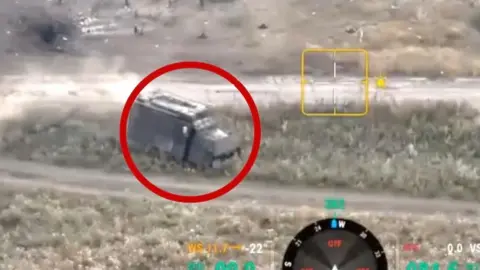 Ukrainian armed forces truck driving off road as it attempts to evade Russian fire