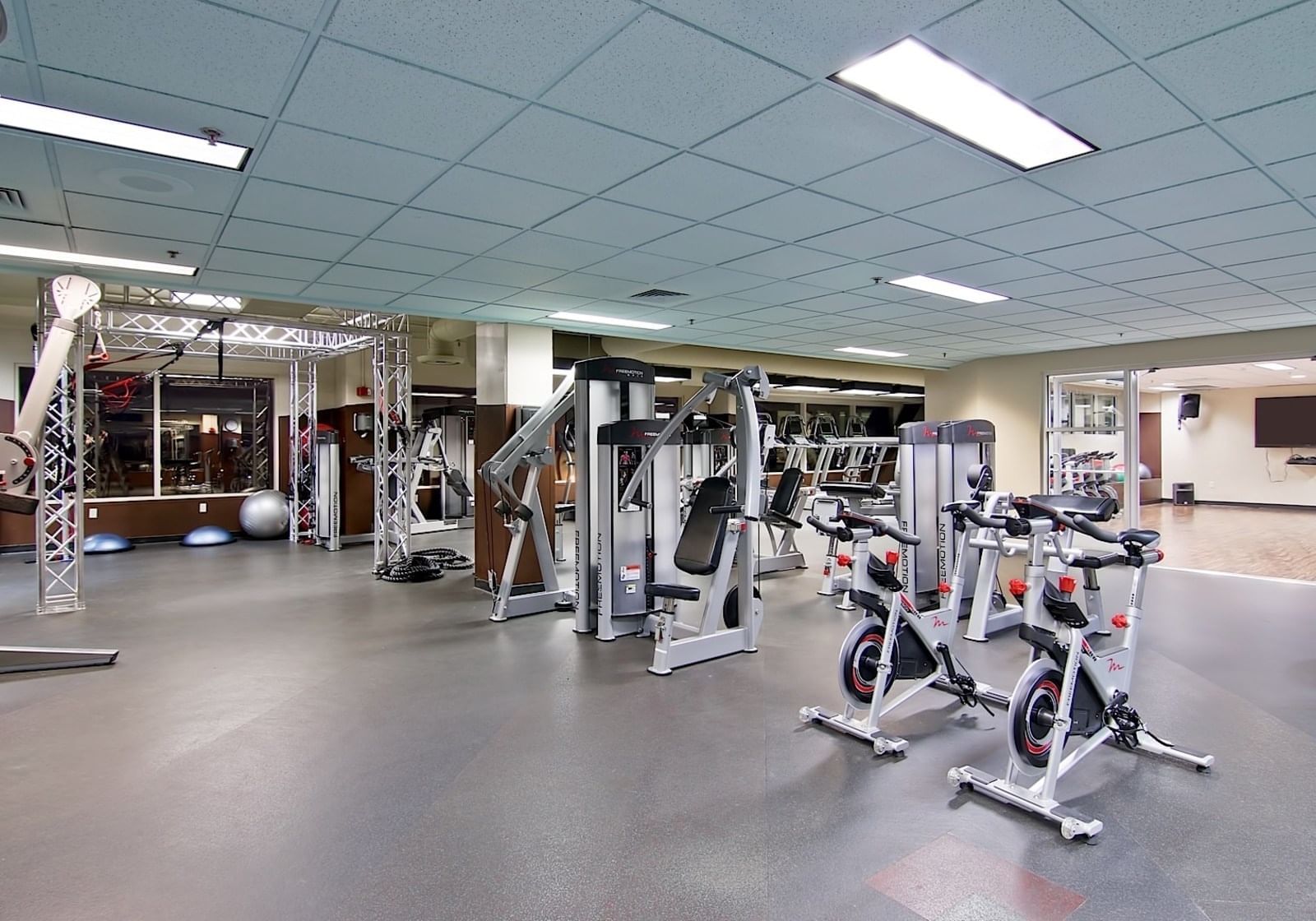 Fully equipped fitness center with Treadmills and TV at The Grove Hotel