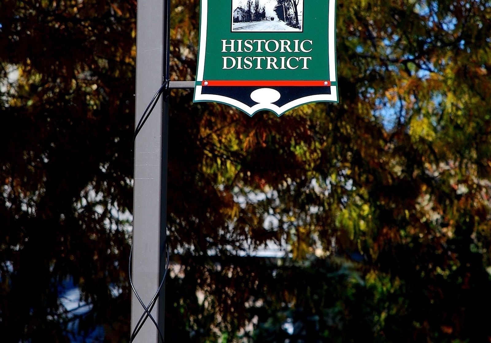 Close-up on a sign on a street corner near The Grove Hotel