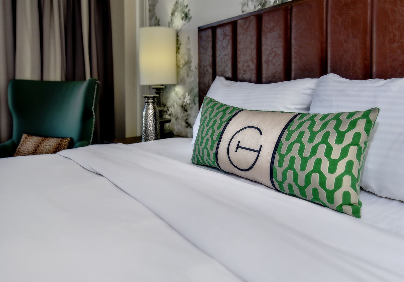 Close-up of a pillows in King Deluxe bedroom at The Grove Hotel