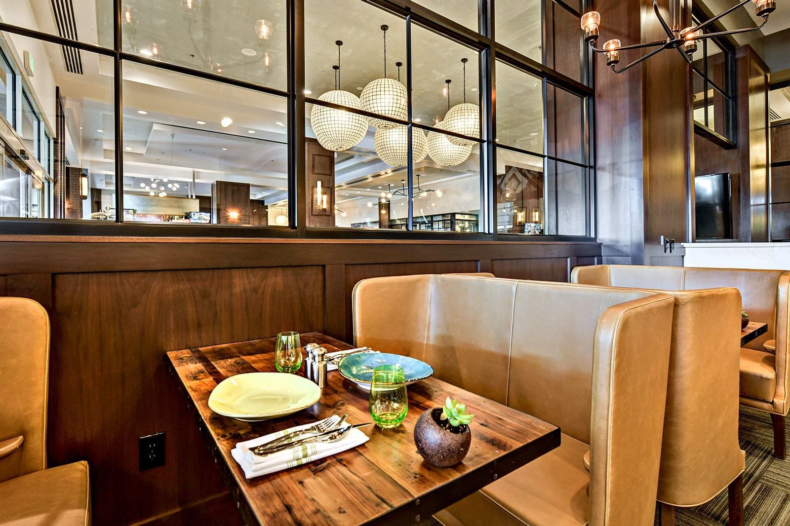 Booth in dining area in Trillium Restaurant at The Grove Hotel