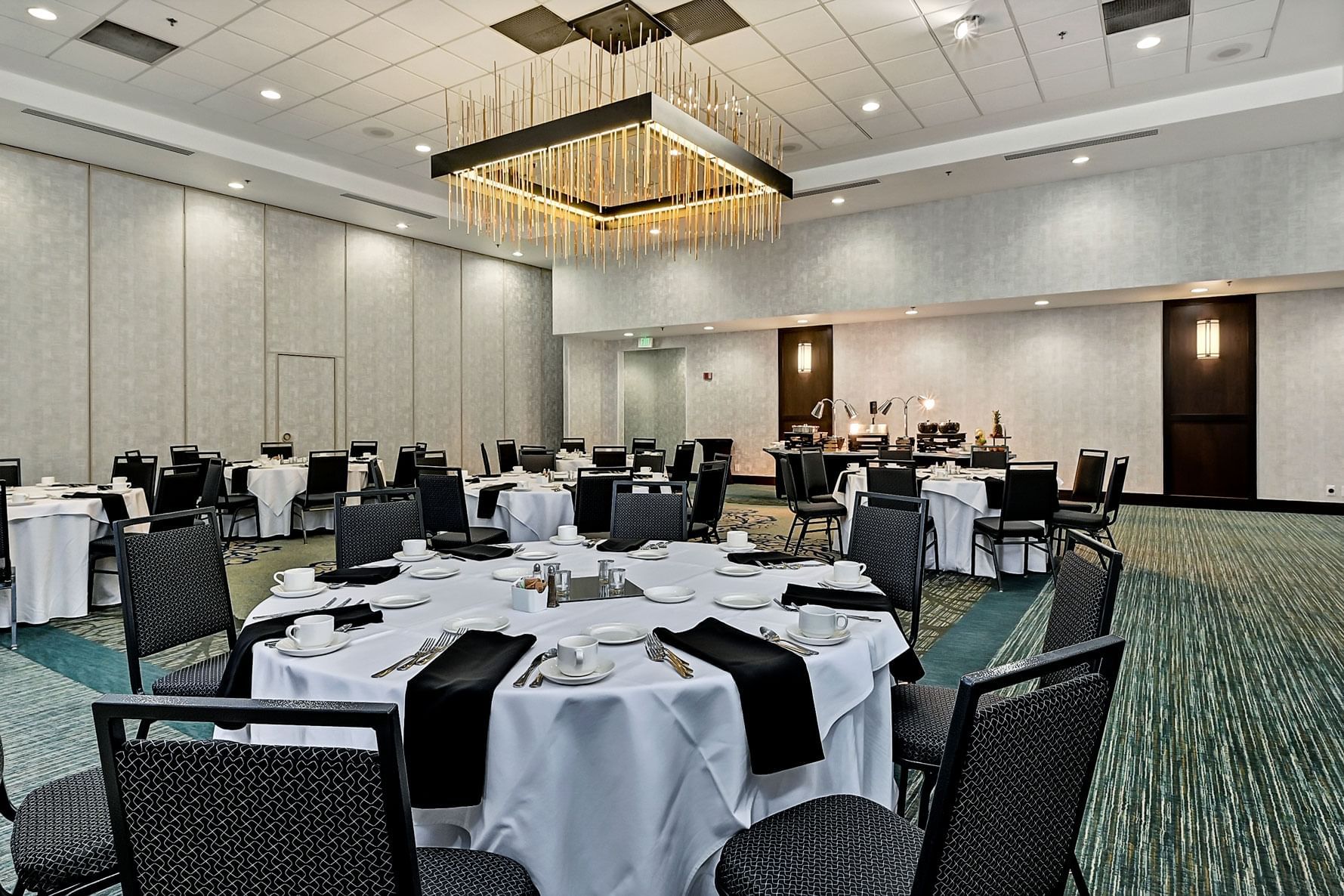 Banquet table setup in a event room at The Grove Hotel