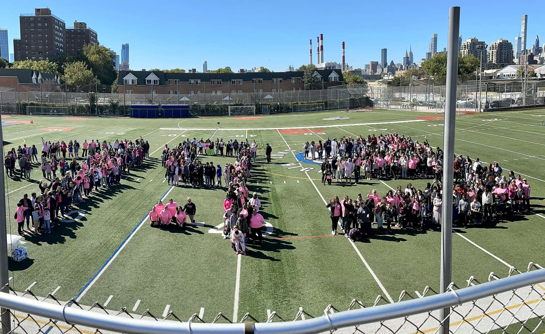 993 made by students and staff standing in a field