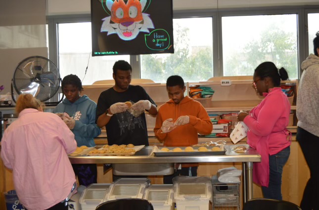 Student's making meals.