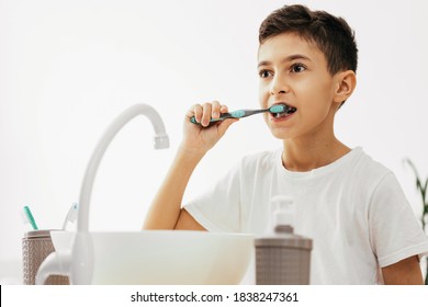 10 Year Old Boy Brushing His Stock Photo (Edit Now) 1838923705