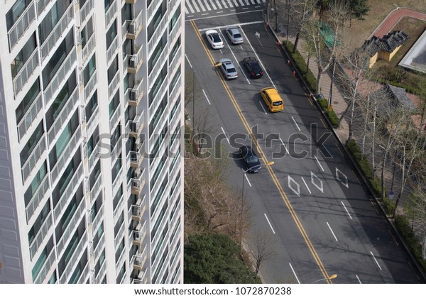 Car on the road from the\
rooftop