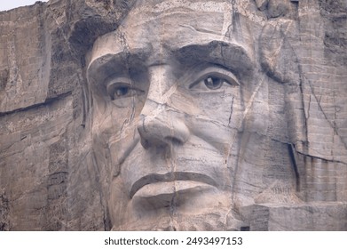 The close up face of Abraham Lincoln on Mount Rushmore