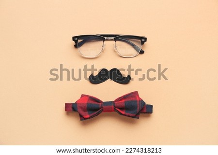 Similar – Funny face on paper bag with glasses and mustache