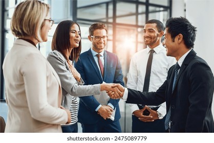 Group, business people and shaking hands for welcome, introduction or meeting in office. Handshake, smile and team with deal for collaboration, agreement or thank you for b2b partnership opportunity