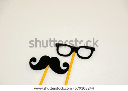 Similar – Funny face on paper bag with glasses and mustache