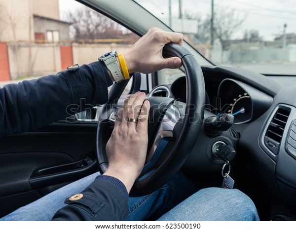 Nervous man driver pushing\
car horn