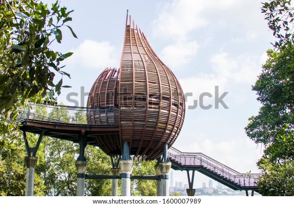 The observation point next to kingfisher pond\
in the Sungei Buloh wetland reserve Singapore, an import stop-over\
point for migratory birds. \
The background is the buildings of\
JOHOR BAHRU Malaysia.