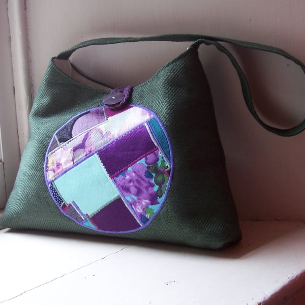 Textile shoulder bag in forest green with art panel