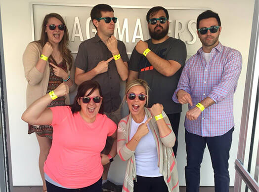 The team shows off their VIP wristbands for the Wamego Fireworks show