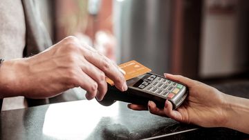 Surcharges on debit cards could be banned under a federal government plan. 