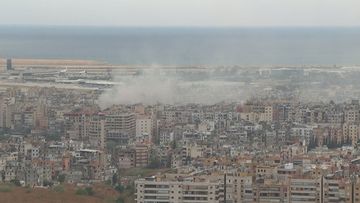 Smoke rises from buildings in Beirut in Lebanon at 9am (local time) after Israel&#x27;s overnight cross-border ground invasion into the country&#x27;s south attacking militant group Hezbollah. 