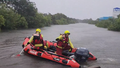 Reports woman swept away in Townsville floodwaters amid pouring rain