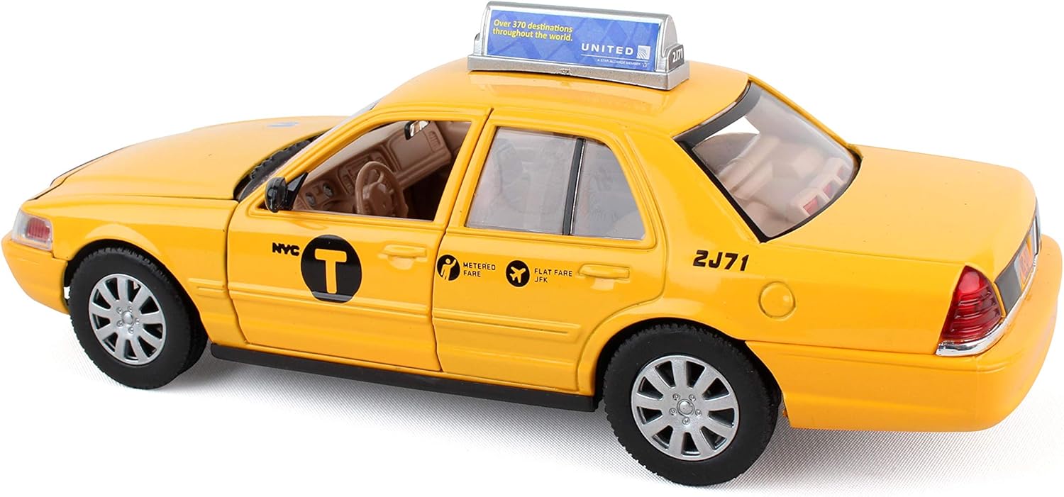 Amazon Com Daron New York City Taxi 1 24 Die Cast Toys Games