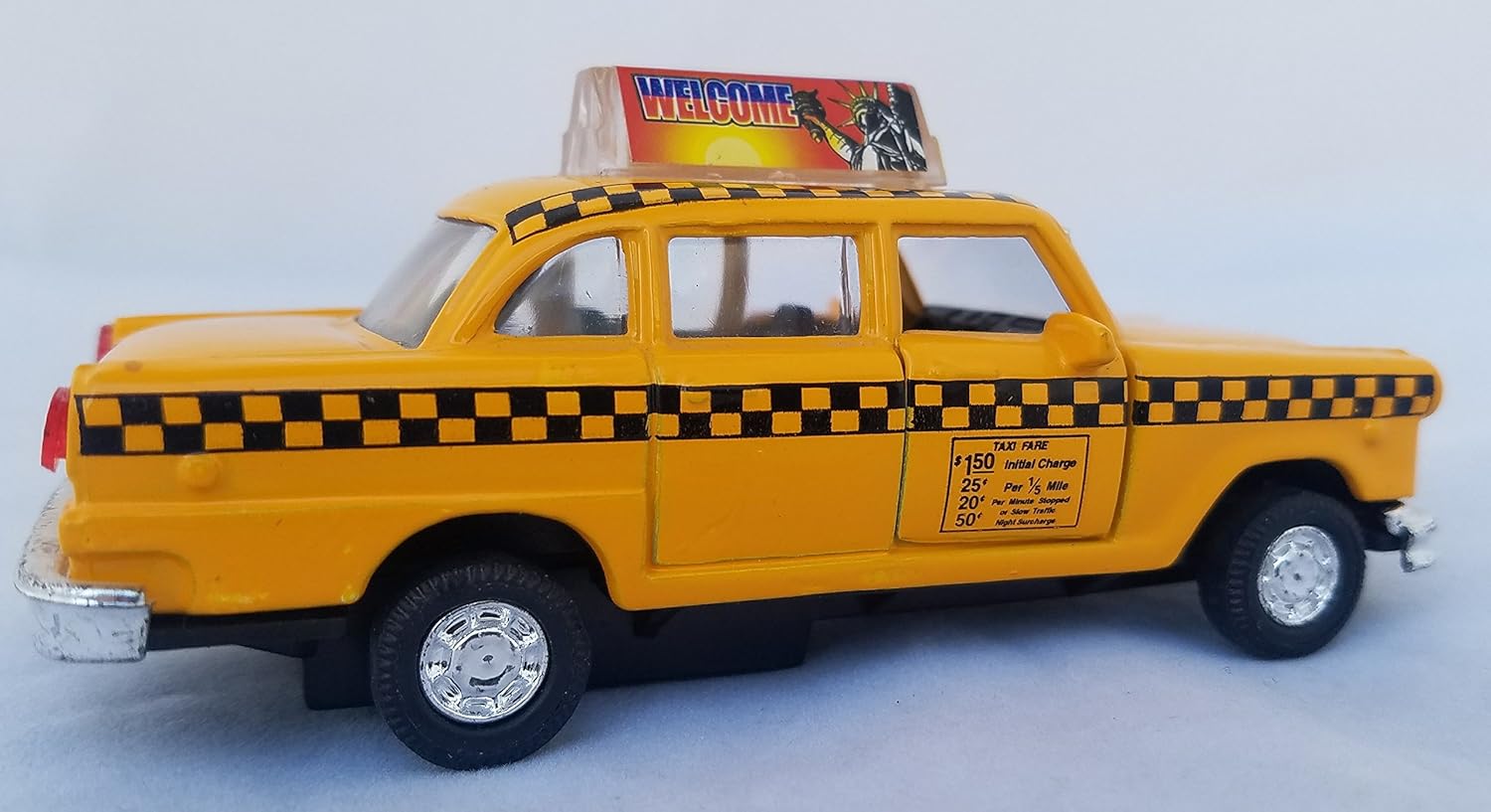 Amazon Com Taxi 1 32yellow With Black Checkers 95ny Nyc Yellow Taxi Cab 4 5 Diecast Metal Car This Old Fashioned Yellow New York City Checker Taxicab Car Has Pullback Motor Action And Opening Doors