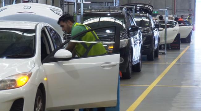 Amazon delivery drivers rush to get presents to people before Christmas.