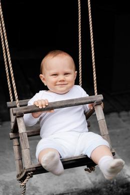 baby boy on a swing