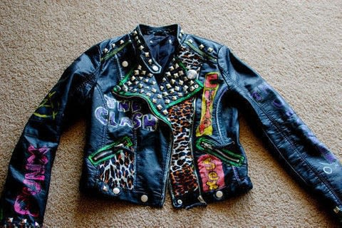 Revamp a punky leather jacket. .  Free tutorial with pictures on how to decorate a leather jacket in under 40 minutes by embellishing with fabric, scissors, and paint. Inspired by punk, audrey kitching, and leopard print. How To posted by Audrey Kitching. Difficulty: 3/5. Cost: Cheap. Steps: 6