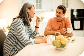 A woman and a man drinking coffee together