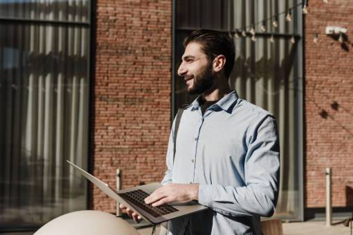 business Man holding notebook at the office 