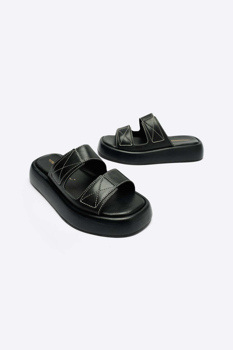 "INTENTIONALLY __________." KIARA FLATFORM SANDAL - Bark/Black