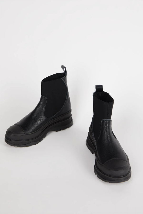 "INTENTIONALLY __________." Court Lug Sole Boot