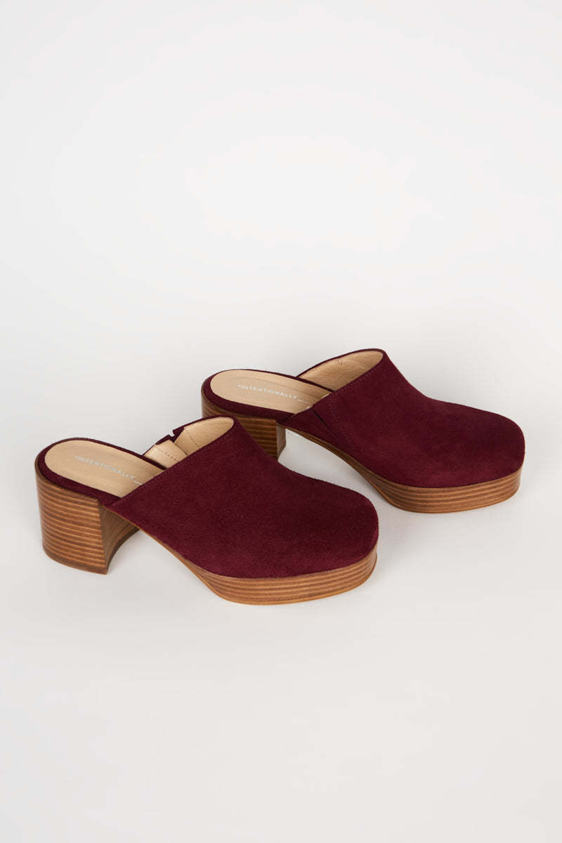 "INTENTIONALLY __________." Facts Suede Platform Clog - Raspberry