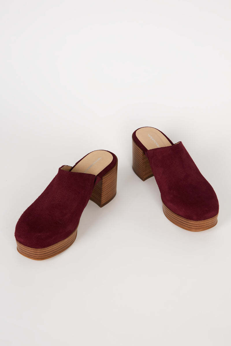 "INTENTIONALLY __________." Facts Suede Platform Clog - Raspberry