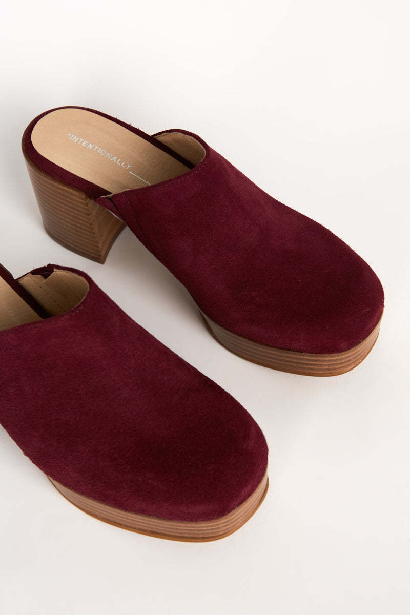 "INTENTIONALLY __________." Facts Suede Platform Clog - Raspberry