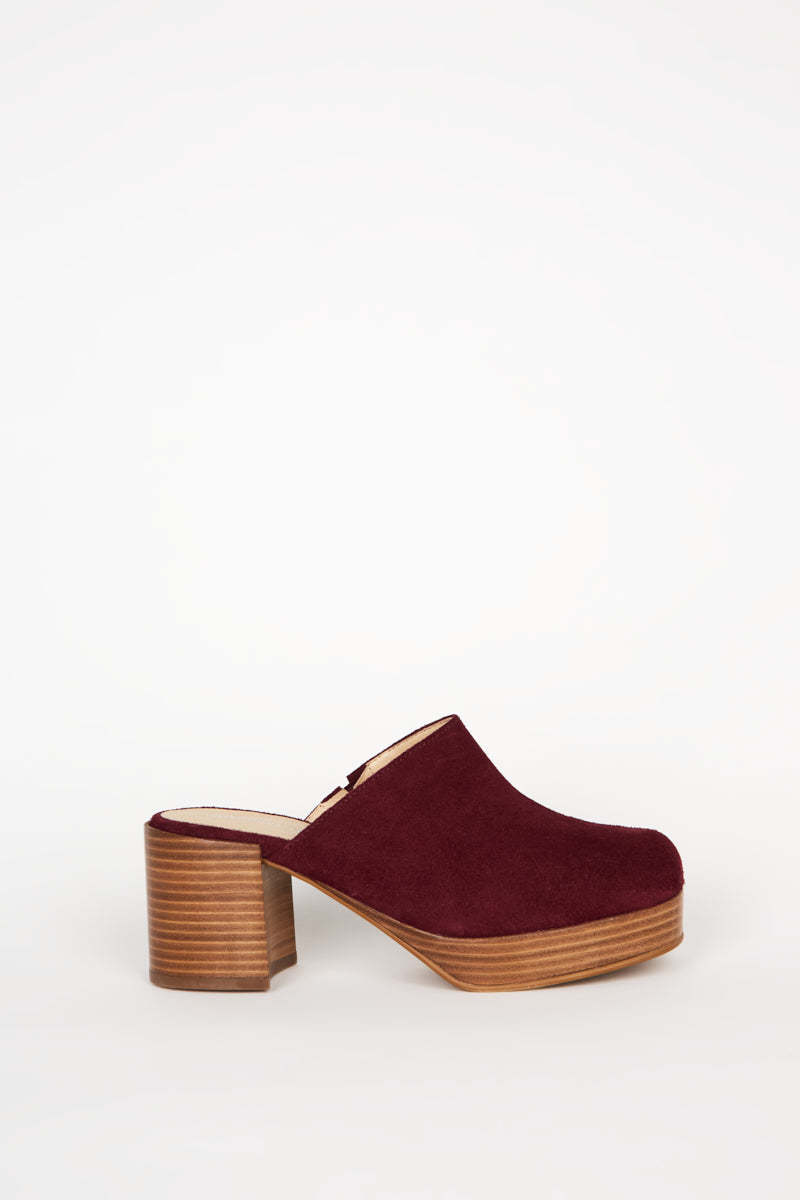 "INTENTIONALLY __________." Facts Suede Platform Clog - Raspberry