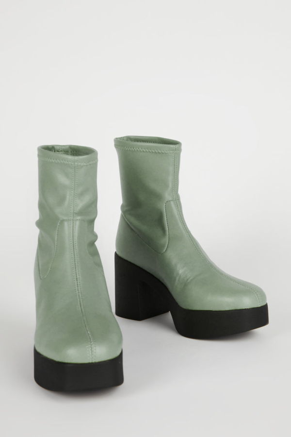 "INTENTIONALLY __________." MARLOWE PLATFORM VEGAN BOOT - SKY