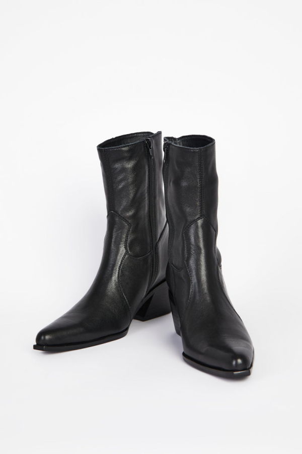 "INTENTIONALLY __________." Mattie Heeled Boot