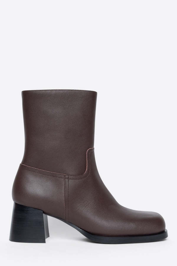 "INTENTIONALLY __________." VICO HEELED BOOT