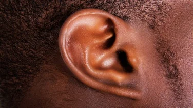 closeup of the outer ear of a man