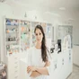 pharmacist in front of pharmacy counter