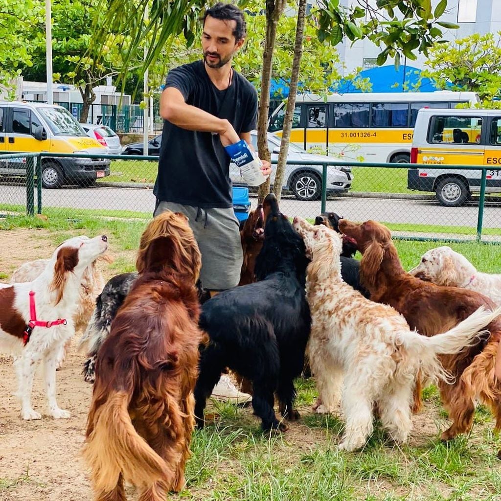 Jefferson Machado with his eight dogs