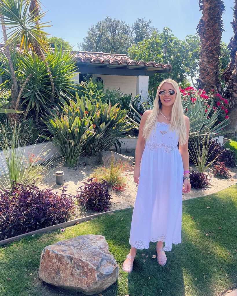 Emma Roberts in a white prada maxi dress