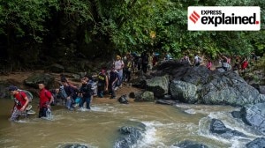 Illegal Immigrants in US Dunki Route Journey Explained: Migrants cross a river in the Darién Gap in Colombia to reach the United States.