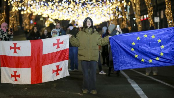 Thousands in Georgia human chain as pro-EU protests enter 2nd month