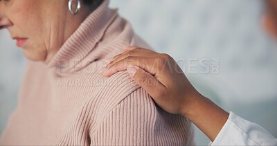 Sympathy, consoling and closeup of caregiver with woman after cancer diagnosis in retirement home. Healthcare, consultation and zoom of elderly female patient with hand of doctor at checkup in room.