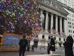 After a strong holiday week, Wall Street took a downturn as some sectors pull back. (AP PHOTO)