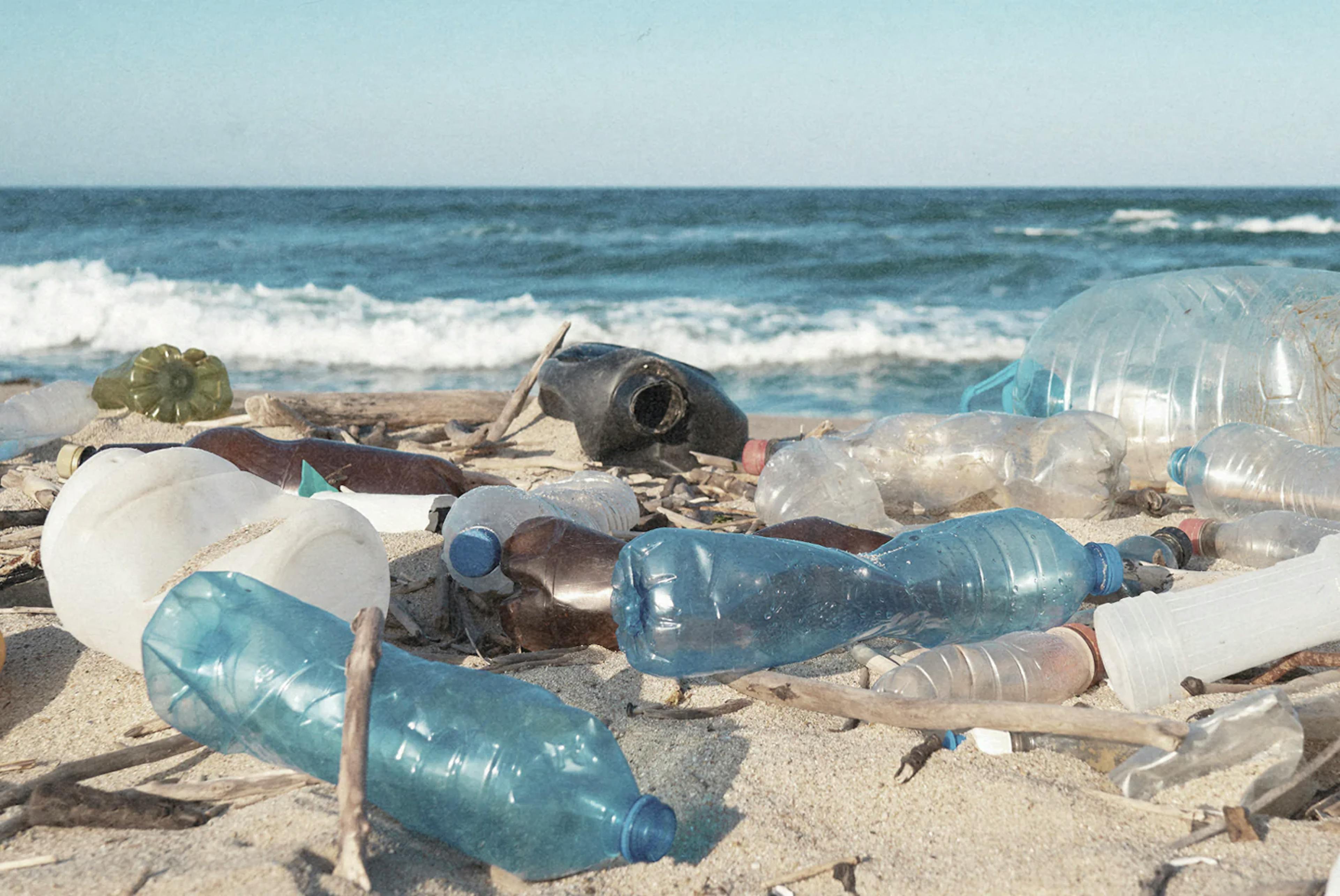 mixed plastic waste on a beach