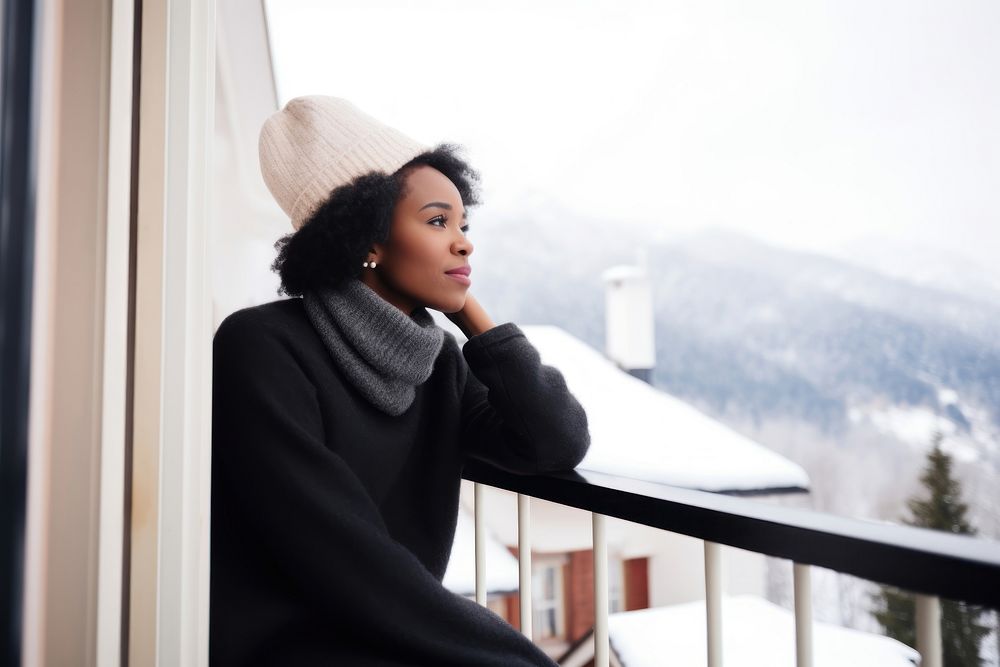 African american woman architecture sitting balcony. 